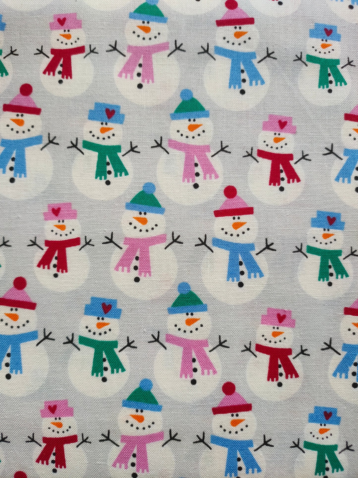 Copenhagen Print Factory Snowman 100% cotton fabric. Fat Quarter. Snowmen wearing hats and scarfs on a light grey background.