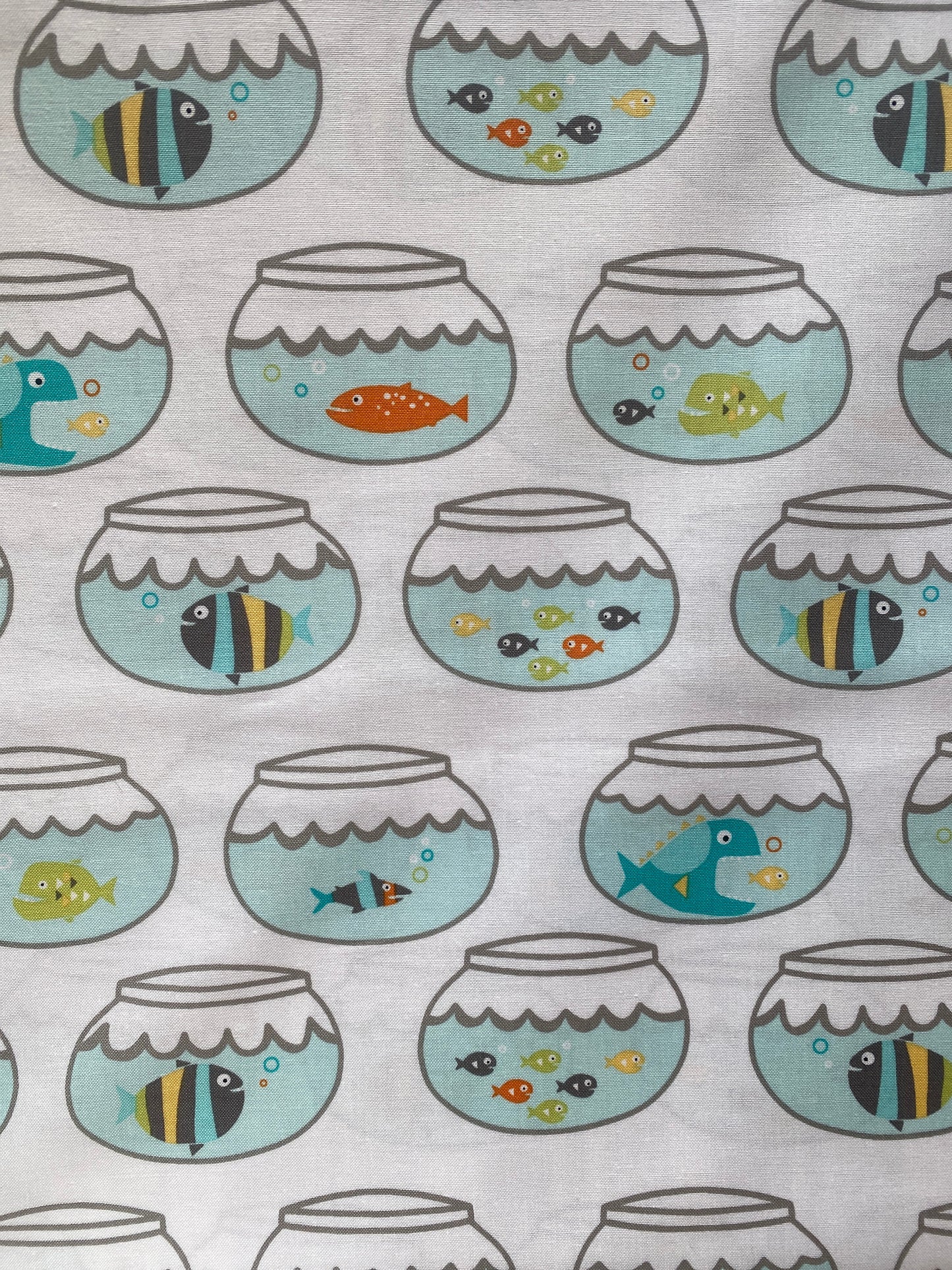 Michael Miller Swimming In Circles 100% cotton fabric. Fat Quarter. Fish in bowls on a white background.