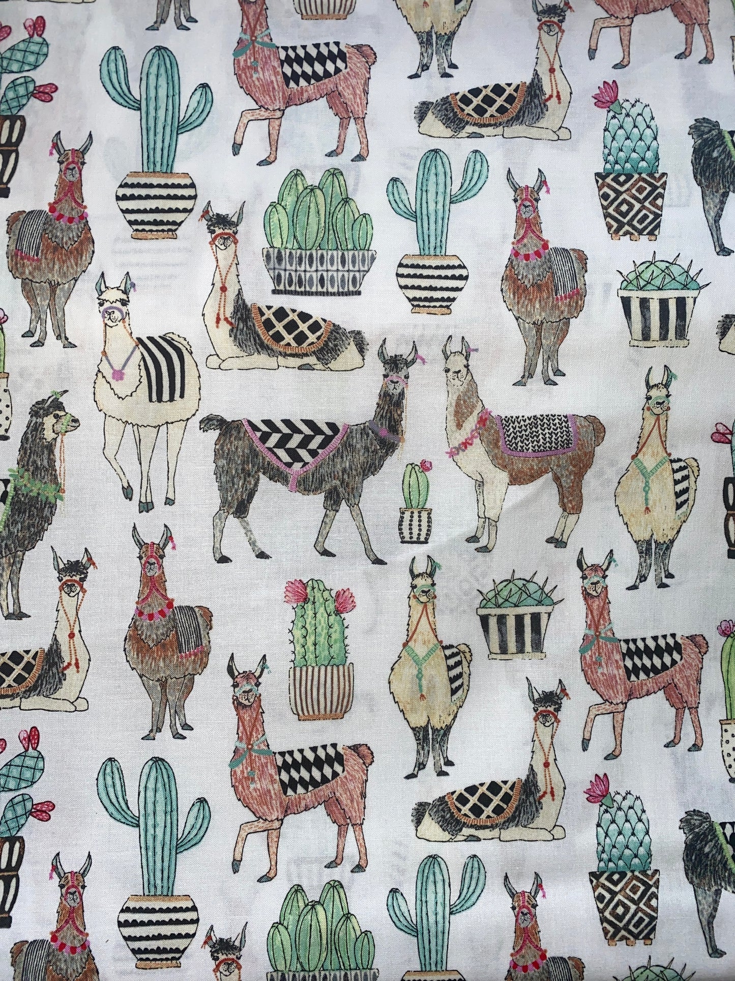 Michael Miller Lovely Llamas 100% cotton fabrics. Fat Quarter. Llamas and cactus on a white background.
