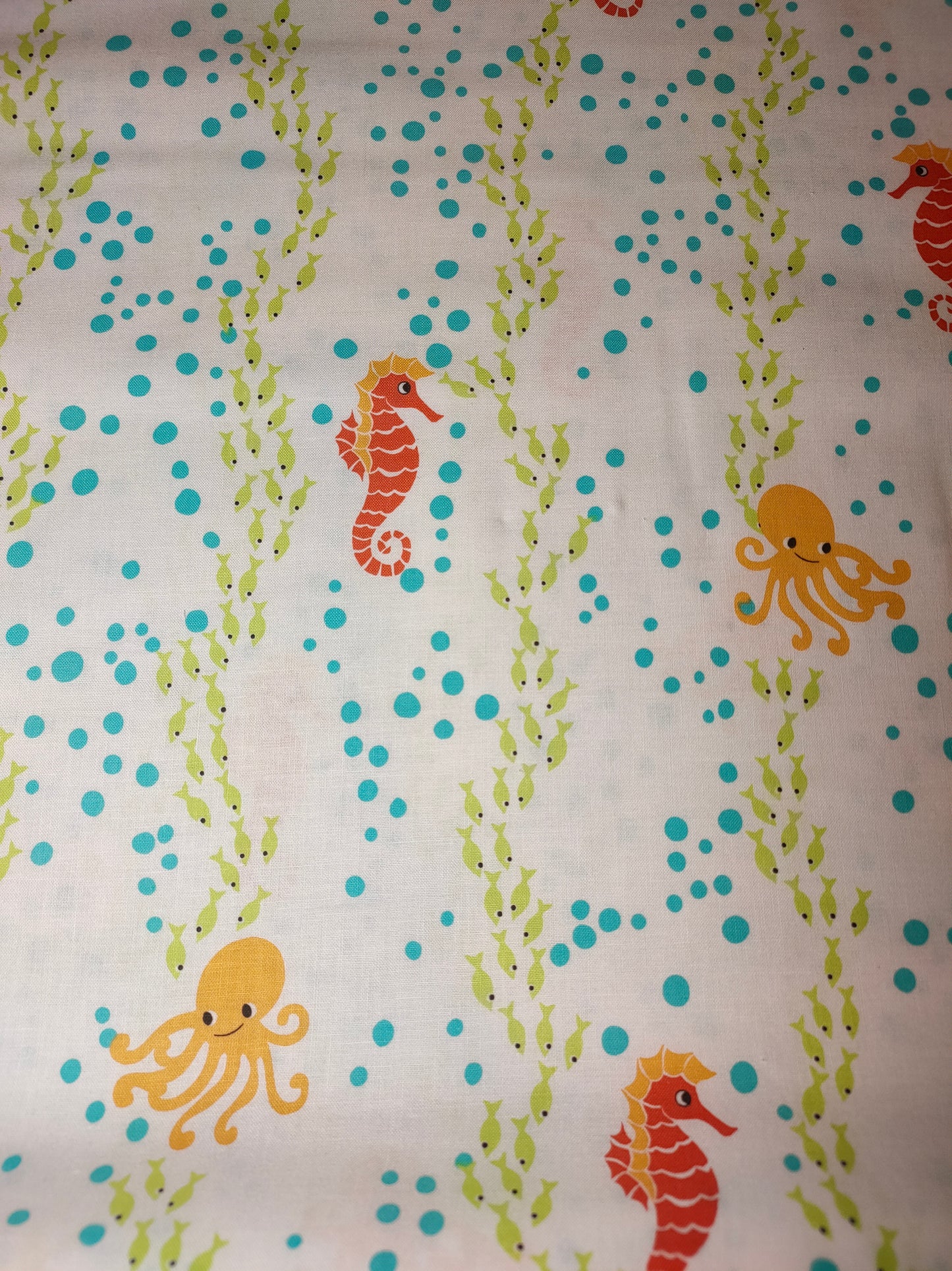 Michael Miller Floatin With The Fishes 100% cotton fabric. Fat Quarter.  Seahorse, Octopus and fishes on a white background.