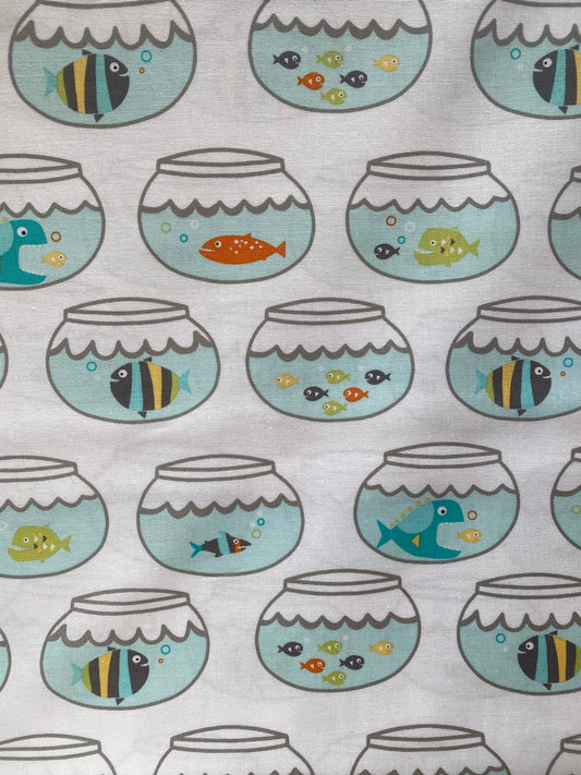 Michael Miller Swimming In Circles 100% cotton fabric.  Fat Quarter.  Fish in bowls on a white background.