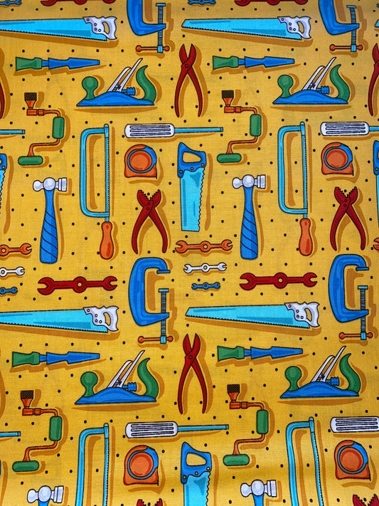 Michael Miller Workbench 100% cotton fabric. Fat Quarter.  Tools on a yellow background.