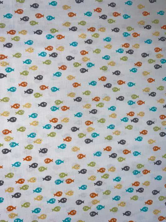 Michael Miller Guppies 100% cotton fabric. Fat Quarter.  Fish on a white background.