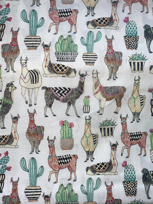 Michael Miller Lovely Llamas 100% cotton fabrics. Fat Quarter. Llamas and cactus on a white background.